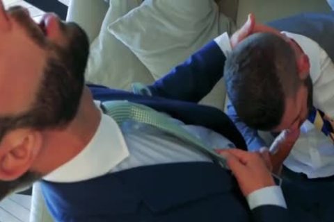 2 Suited males fucking